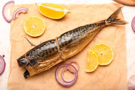 Tasty smoked mackerel on table
