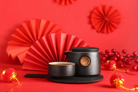 Tasty Chinese tea on color backgroundの写真素材