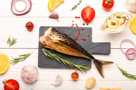 Tasty smoked mackerel on tableの写真素材