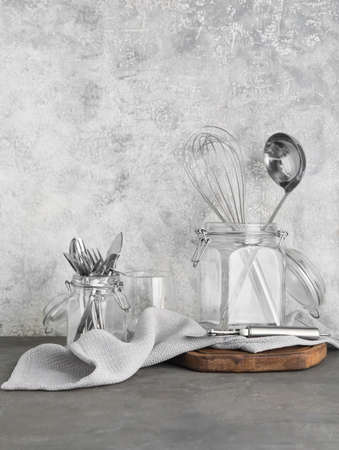 Set of stylish tableware on grunge background