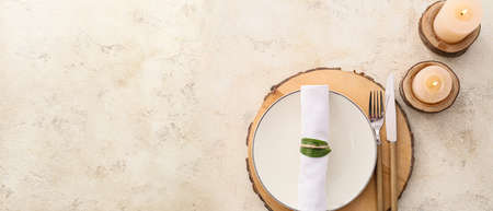 Beautiful table setting in eco style on light background with space for text