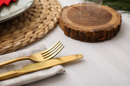 Dining table with beautiful setting for Christmas celebration, closeupの写真素材