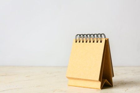 Blank craft calendar on tableの写真素材