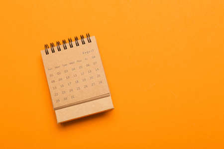 Craft calendar on orange backgroundの写真素材