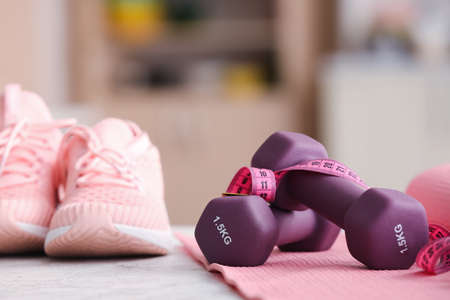 Stylish sport equipment on table in room, closeupの写真素材