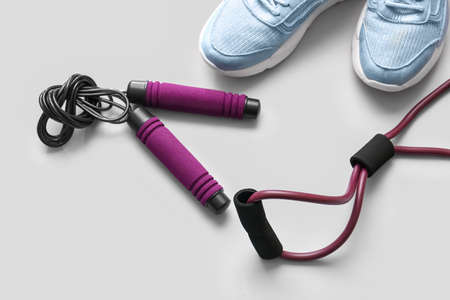 Stylish sport equipment on white background