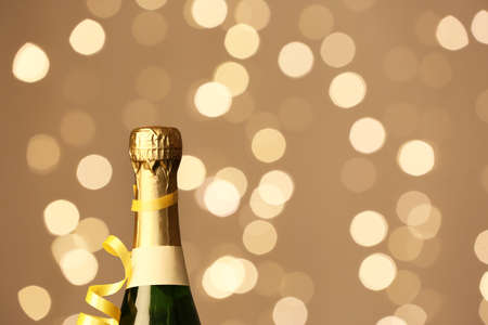 Bottle of champagne against blurred background, closeupの写真素材