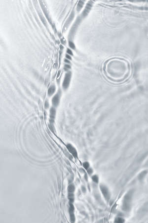 Texture of water on light background