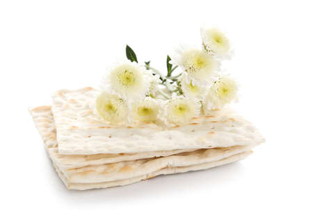Jewish flatbread with flowers on white backgroundの写真素材