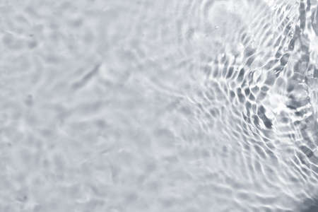 Texture of water on light background