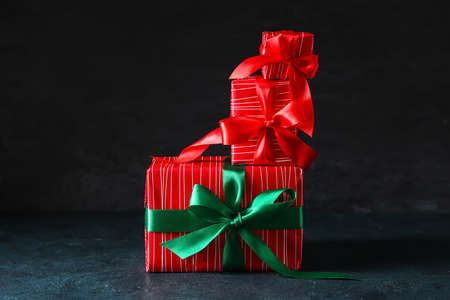 Christmas gift boxes on dark background