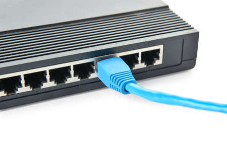 Modern wifi router and internet cable isolated on white background, closeup