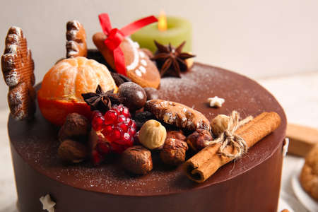 Tasty Christmas chocolate cake on light background, closeupの写真素材