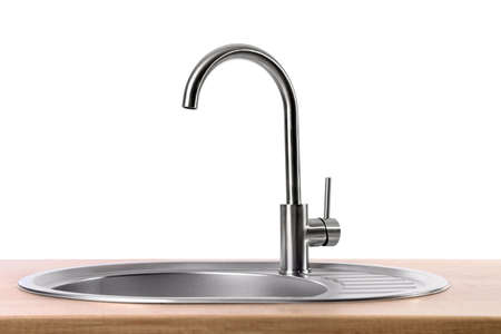 Wooden counter with silver sink on white backgroundの写真素材