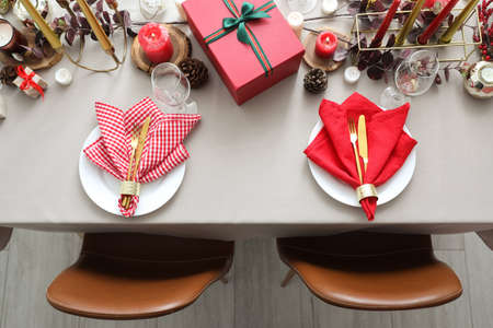 Festive table setting for Christmas celebrationの写真素材