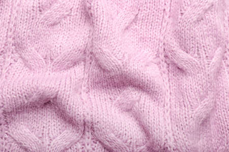 Texture of crumpled knitted fabric with stylish pattern as background