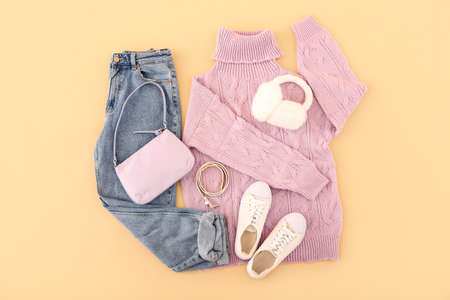 Female clothes, stylish accessories and shoes on color backgroundの写真素材