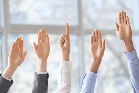 Business people's hands in officeの写真素材