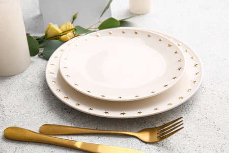 Beautiful table setting for wedding on light background