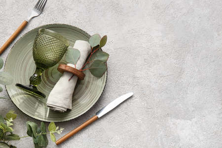 Beautiful table setting for wedding on light backgroundの写真素材