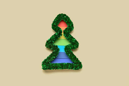 Rainbow Christmas tree on color background. LGBT conceptの写真素材