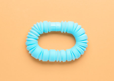 Blue Pop Tube on orange background