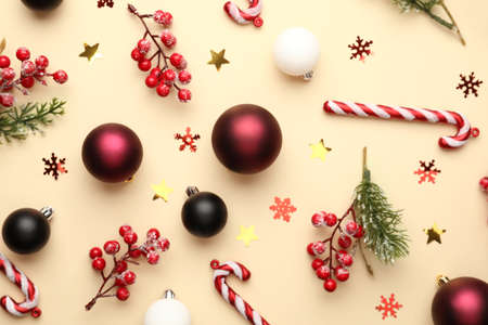 Set of Christmas decorations on color background