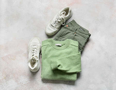 Stylish male sweater, pants and shoes on light backgroundの写真素材