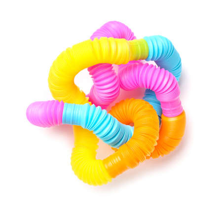 Different colorful Pop Tubes on white background