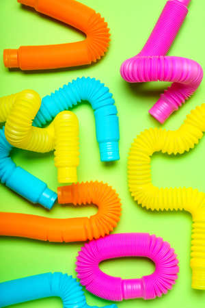 Pop Tubes on green backgroundの写真素材