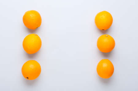Ripe oranges on white backgroundの写真素材