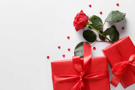 Presents for Valentine's Day, hearts and beautiful roses on light backgroundの写真素材