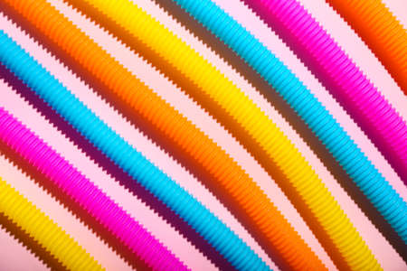 Pop Tubes on pink backgroundの写真素材