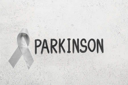 Parkinson's awareness ribbon on grunge backgroundの写真素材