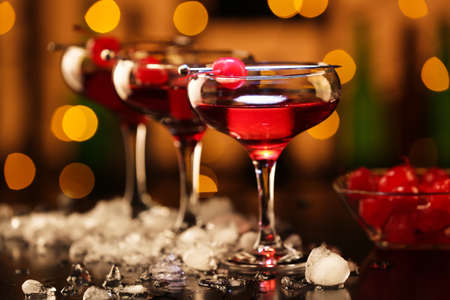 Glasses of tasty Manhattan cocktail on table in barの写真素材