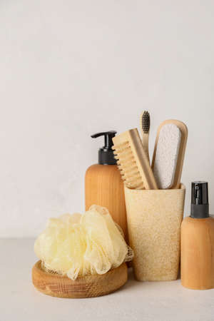 Different bath accessories and cosmetics on tableの写真素材