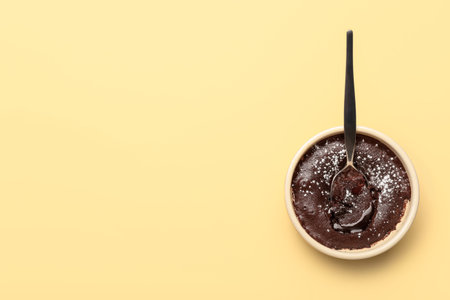 Ramekin with tasty lava cake fondant on beige backgroundの写真素材