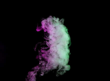 color smoke on black backgroundの写真素材