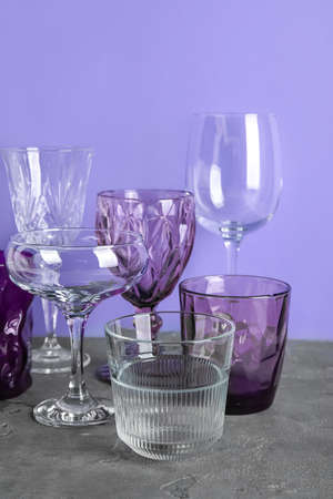 Different empty glasses on tableの写真素材