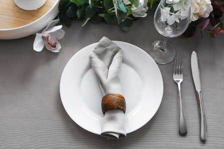 Beautiful table setting with spring flowersの写真素材