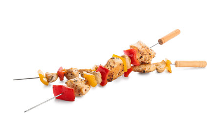 Grilled chicken skewers with vegetables isolated on white backgroundの写真素材