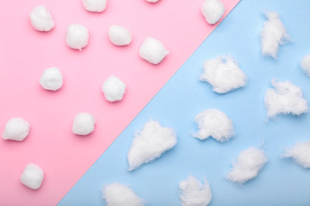 Soft cotton wool on color backgroundの写真素材