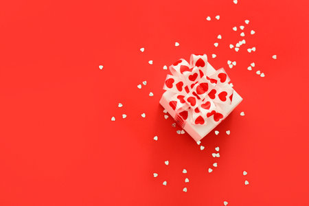 Beautiful gift box on red background. St. Valentine's Dayの写真素材
