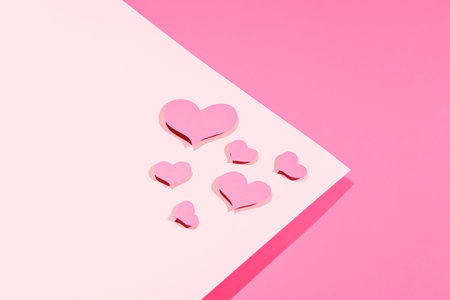Beautiful paper hearts on color background. St. Valentine's Dayの写真素材