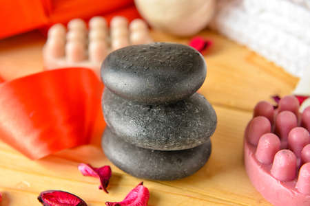 Beautiful spa stones for Valentine's Day celebration on wooden background, closeupの写真素材