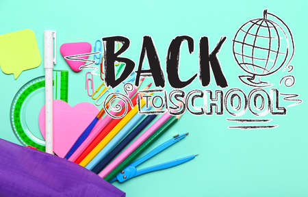 Different stationery and text BACK TO SCHOOL on color backgroundの写真素材