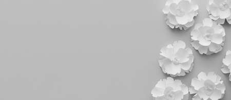 Composition with beautiful paper flowers on gray background with space for text