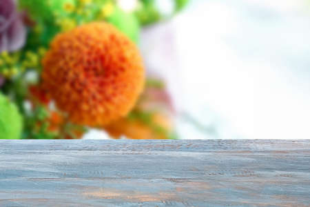 Empty wooden table in flower shopの写真素材
