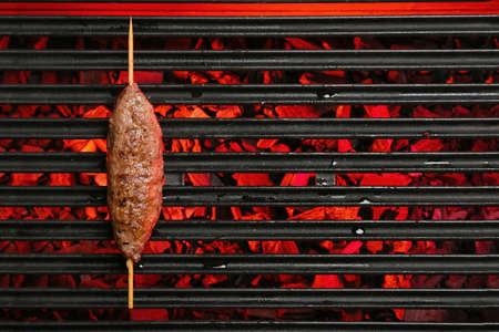 Skewers with tasty lula kebab on grillの写真素材