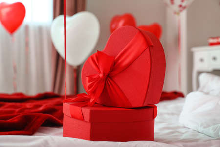 Gifts for Valentine's Day on bed